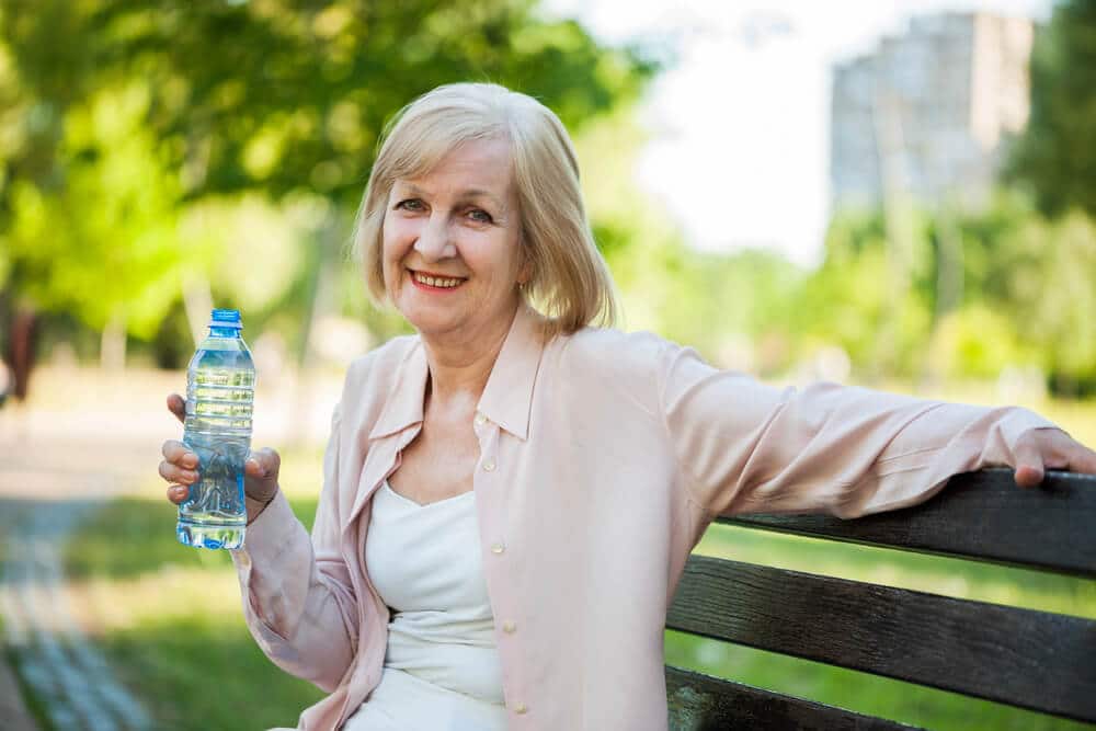 How much water should an older adult drink every day?